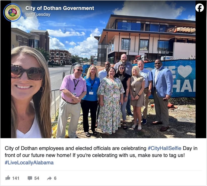 City of Dothan, Alabama Facebook post with employees and elected officials celebrating City Hall Selfie Day in front of their future new city hall